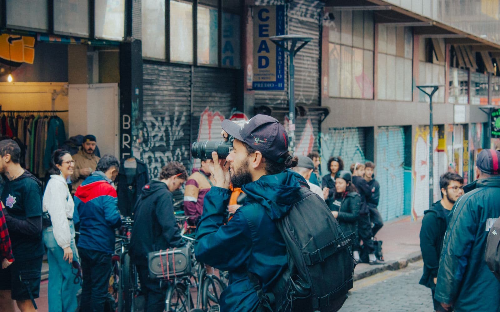 A street photographer capturing candid moments in the city
